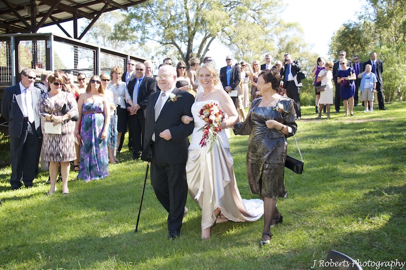 Bride and parents walking down the aisle - wedding photography sydney